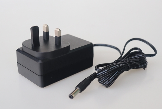 อะแดปเตอร์ Ac Dc เอาต์พุต 24v IEC61558 ได้รับการรับรองพร้อมปลั๊กอังกฤษสำหรับเครื่องฟอกอากาศ