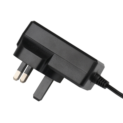 อะแดปเตอร์ Ac Dc เอาต์พุต 24v IEC61558 ได้รับการรับรองพร้อมปลั๊กอังกฤษสำหรับเครื่องฟอกอากาศ